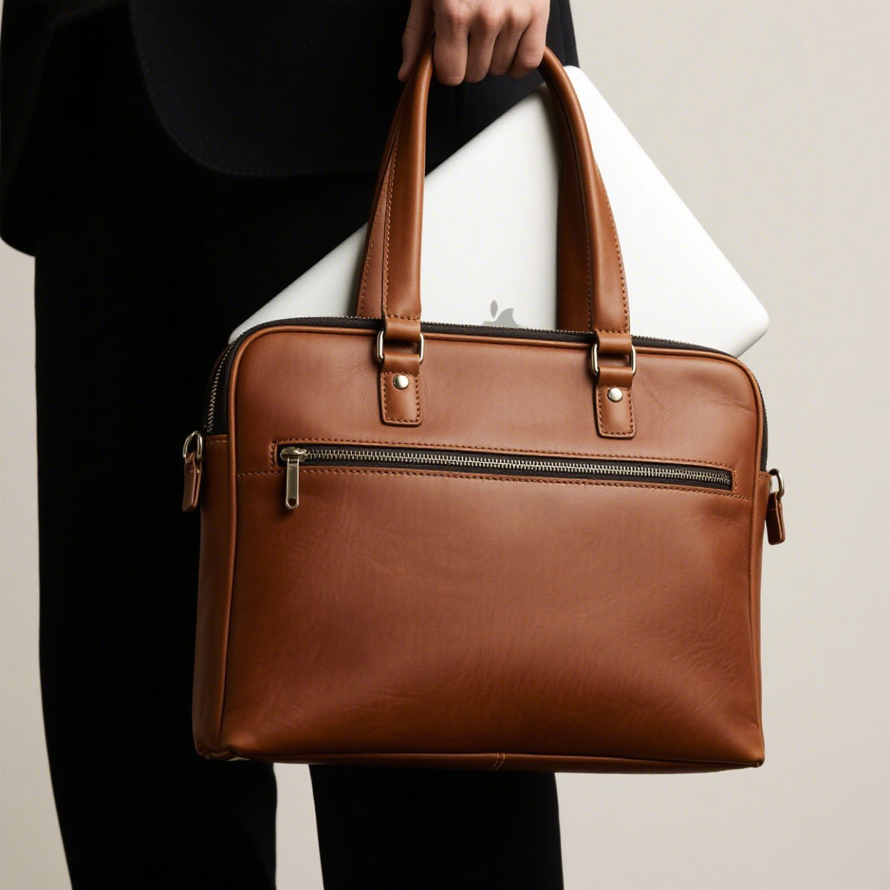 Slim vs spacious: which leather laptop bag style suits your workflow?
