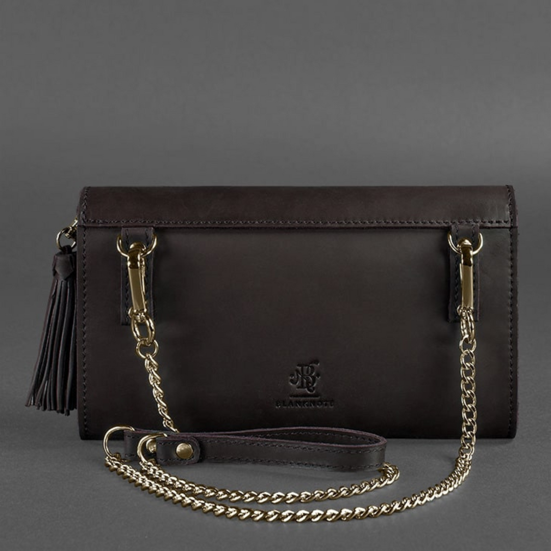 leather clutch bag with wrist strap