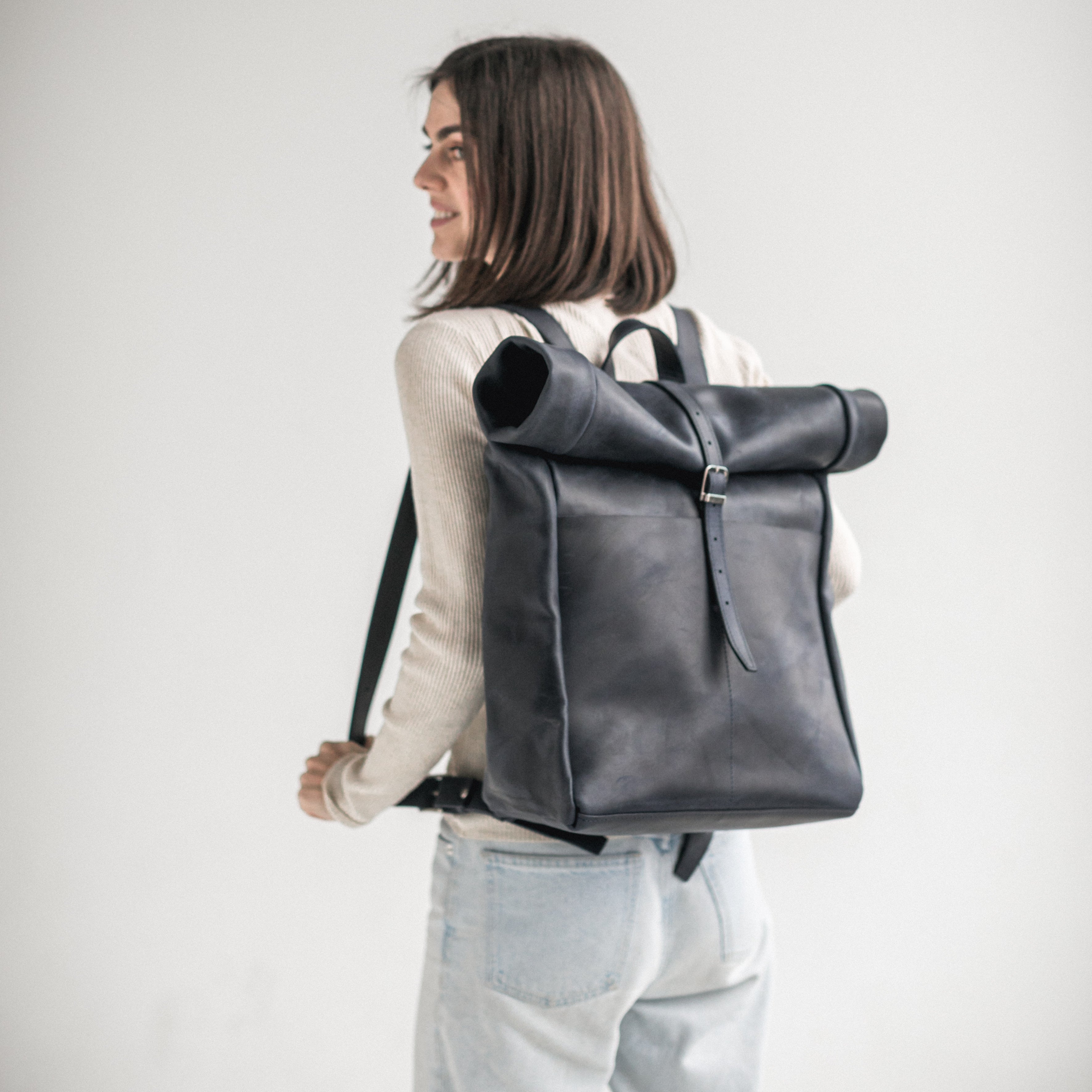 Navy blue leather roll-top backpack Silver