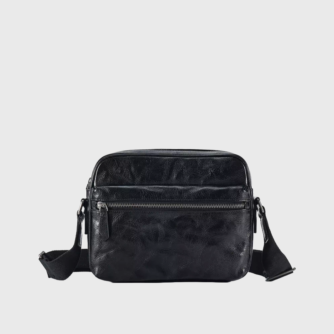 Black small vegetable-tanned leather crossbody bag