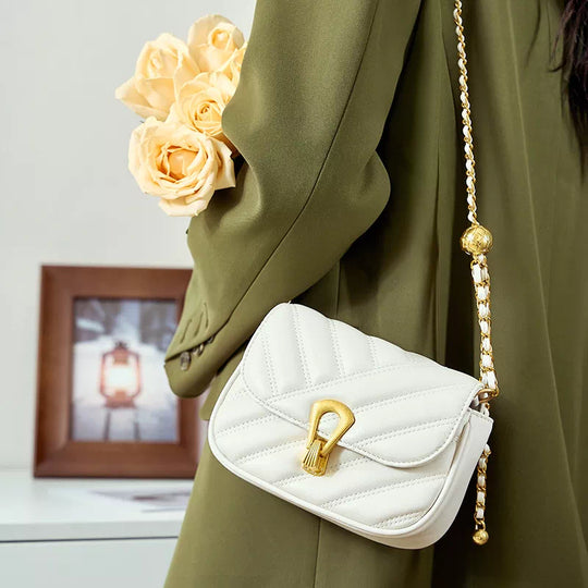 Leather crossbody bag with quilted flap and chain shoulder strap