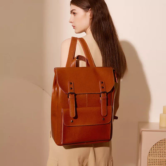Compact leather purse with backpack style