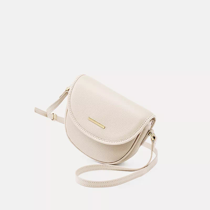 Sophisticated leather saddle purse with stylish crossbody strap
