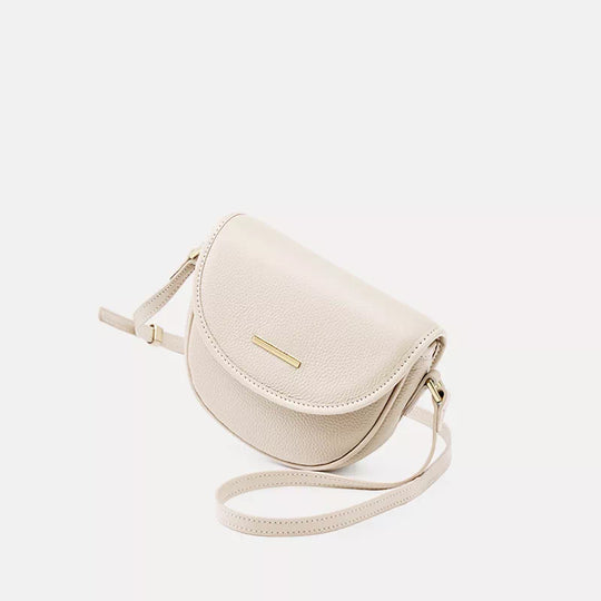 Sophisticated leather saddle purse with stylish crossbody strap