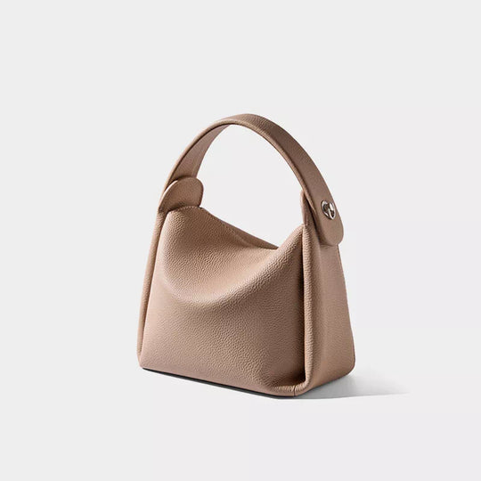 Classic leather crossbody bag with a stylish top handle