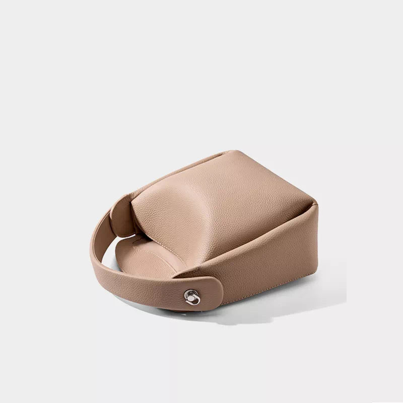 Vintage-inspired crossbody bag with classic design and top handle