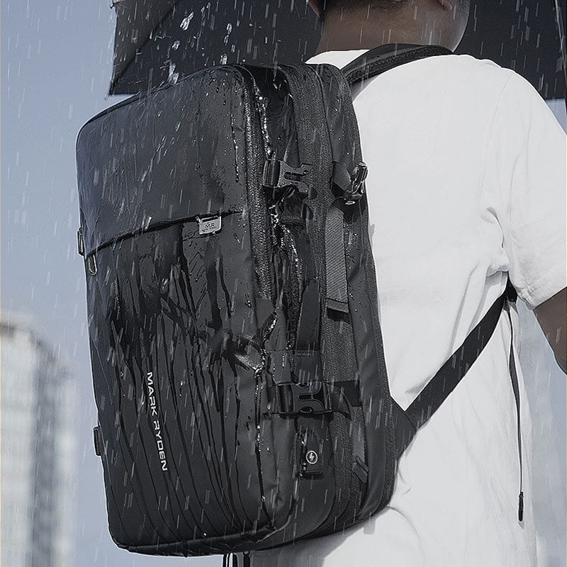 Expandable backpack with USB charging port in black
