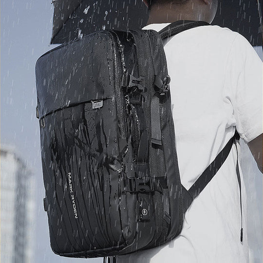 Expandable backpack with USB charging port in black