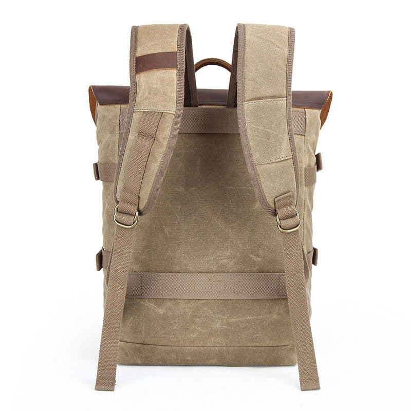 Waxed canvas DSLR camera backpack with lens compartment