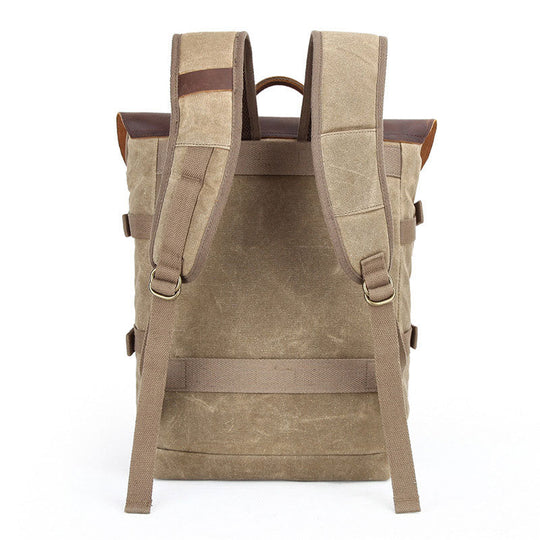 Waxed canvas DSLR camera backpack with lens compartment