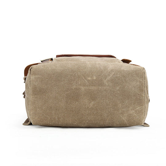 Camera and lens carry backpack in waxed canvas
