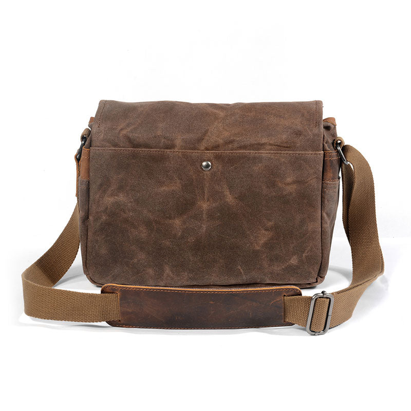 Waxed canvas camera bag with messenger style
