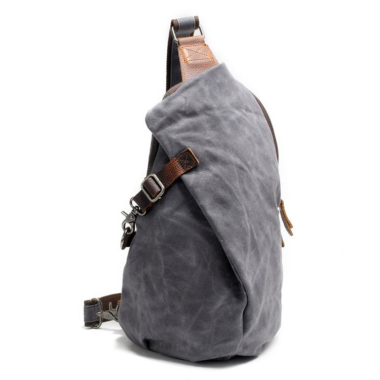 Vintage-style men's waxed canvas sling bag