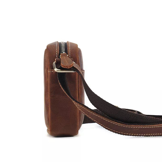 Stylish small leather sling bag with a compact silhouette