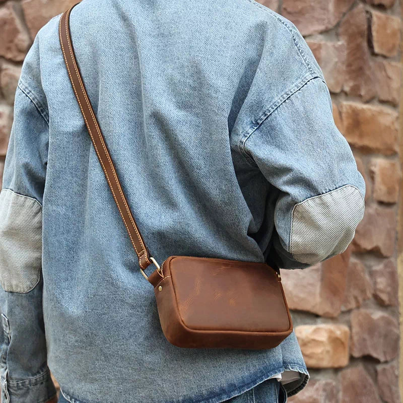Chic and compact leather sling bag with crossbody style