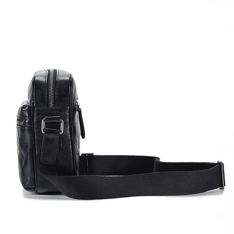 Small black leather crossbody bag with vegetable-tanned finish