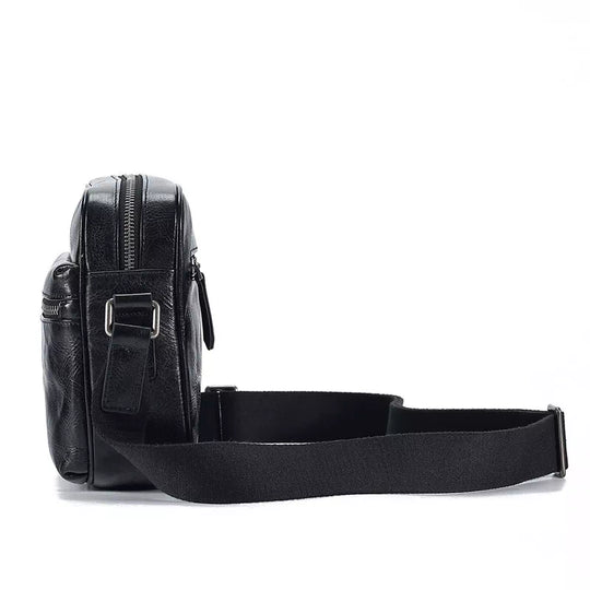 Small black leather crossbody bag with vegetable-tanned finish