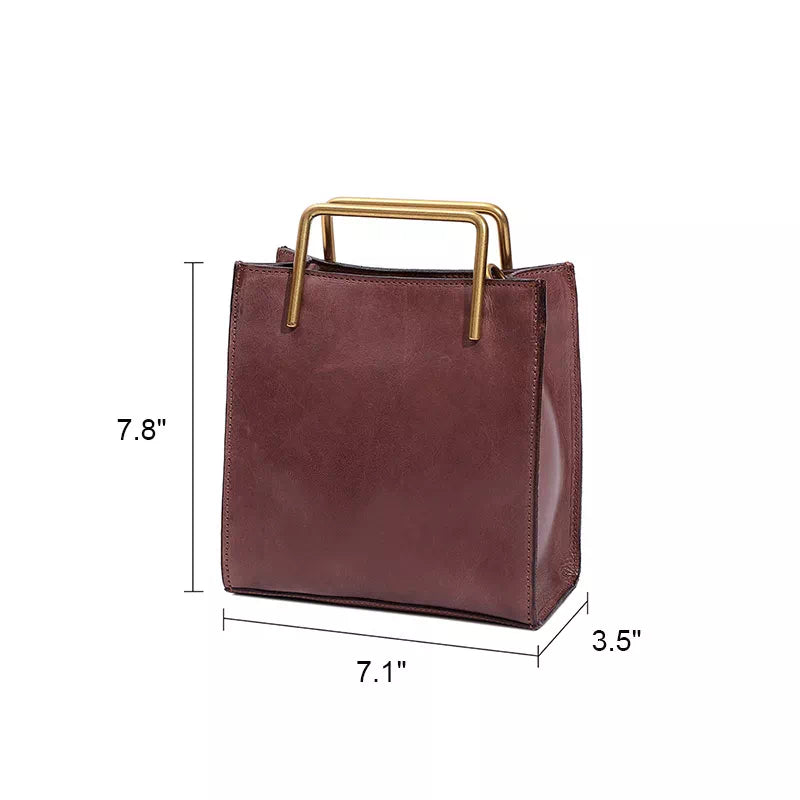 Exclusive designer mini tote with crossbody strap