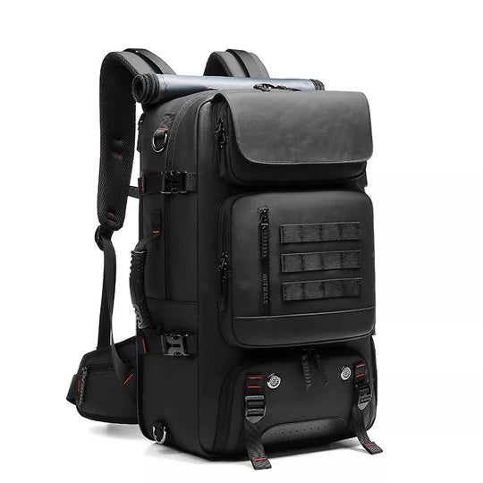 Black travel backpack with expandable feature and charging port