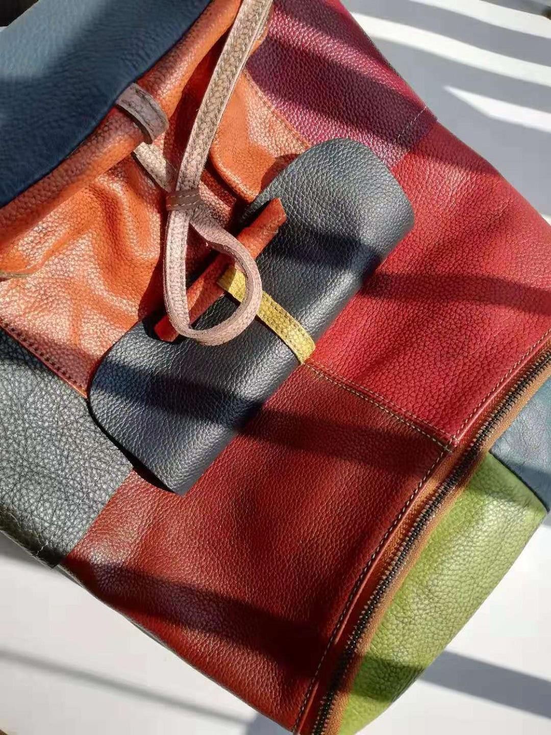 Trekking backpack in multi-color leather cowhide with patchwork design