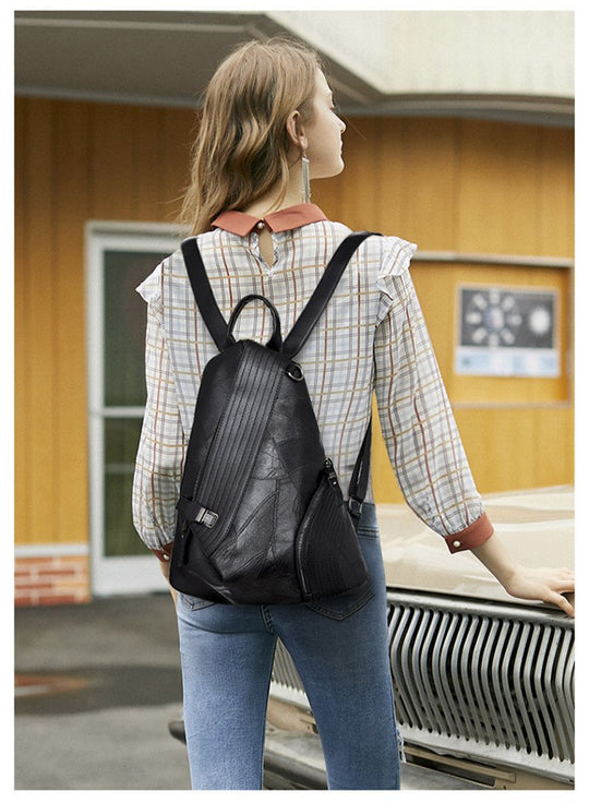 Genuine leather backpack with side zipper in various colors