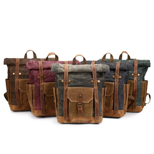 Large canvas leather laptop backpack with waterproof feature for 14-inch laptop