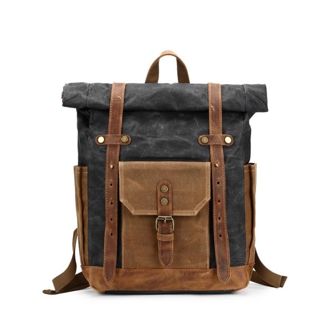 Canvas leather laptop backpack with waterproof feature for 14-inch laptop
