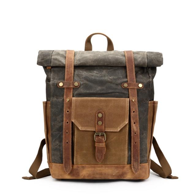 Men's large canvas leather backpack with 14-inch laptop compartment and waterproofing