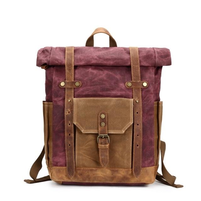 Waterproof canvas leather daypack for 14-inch laptop with large capacity