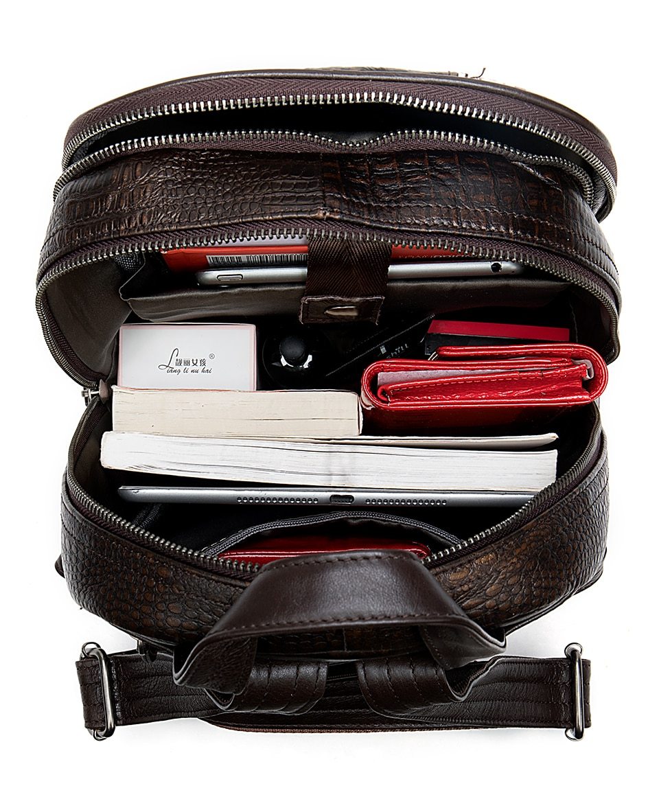 Trekking backpack in multi-color leather with embossed details and patchwork design