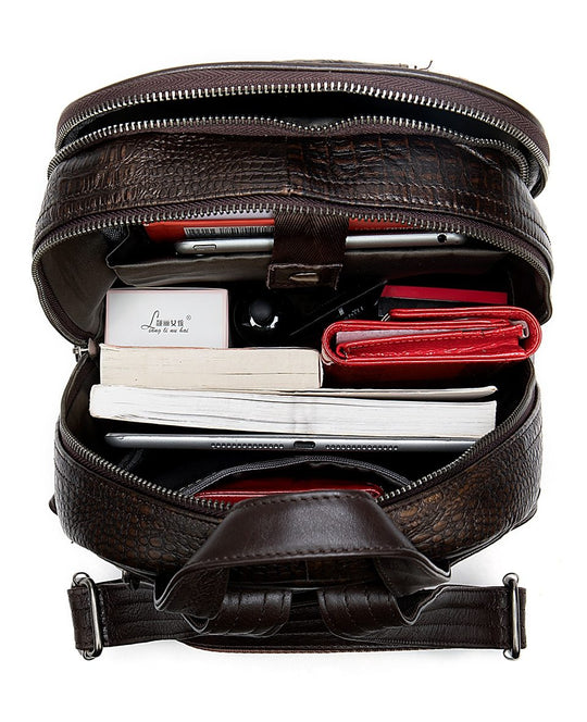 Trekking backpack in multi-color leather with embossed details and patchwork design