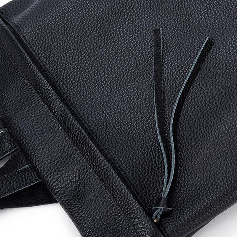 Trekking backpack in genuine leather with a simple and clean design, available in black, apricot, and brown