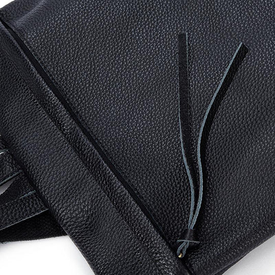 Trekking backpack in genuine leather with a simple and clean design, available in black, apricot, and brown