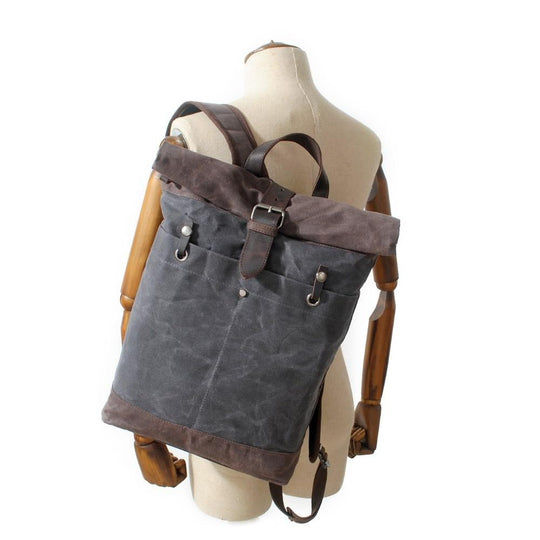 Men's canvas leather student backpack with 15-inch laptop compartment 20 liters