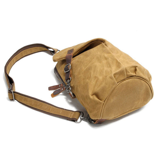 Old-fashioned men's waxed canvas shoulder bag