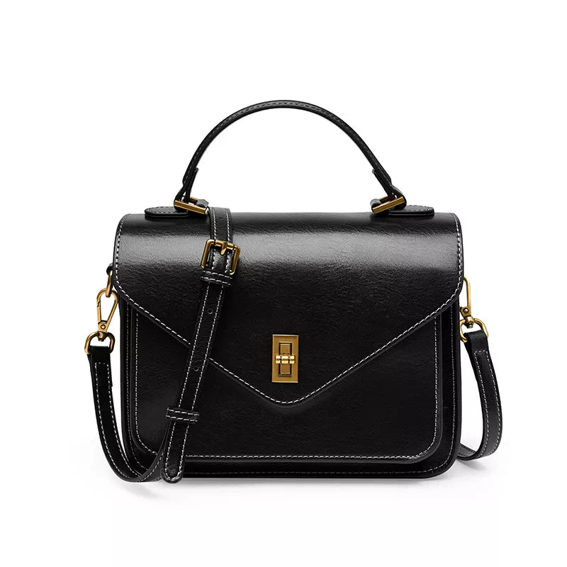 Elegant top handle purse with a compact size
