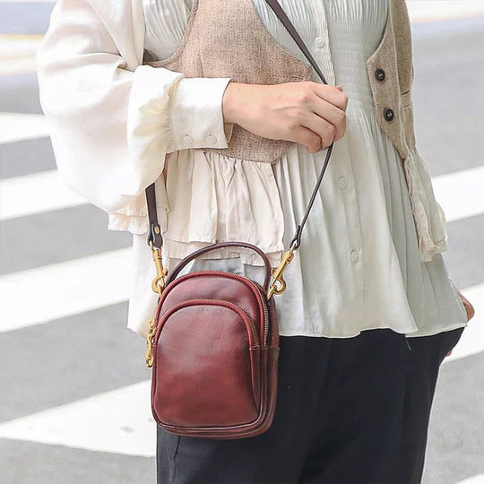 Stylish women's mini sling backpack in leather
