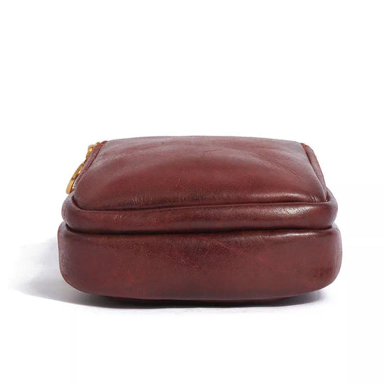 Compact and stylish women's leather sling backpack