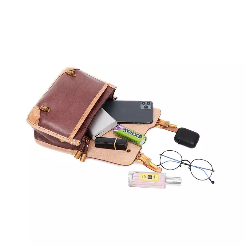 Compact satchel bag with exclusive detailing