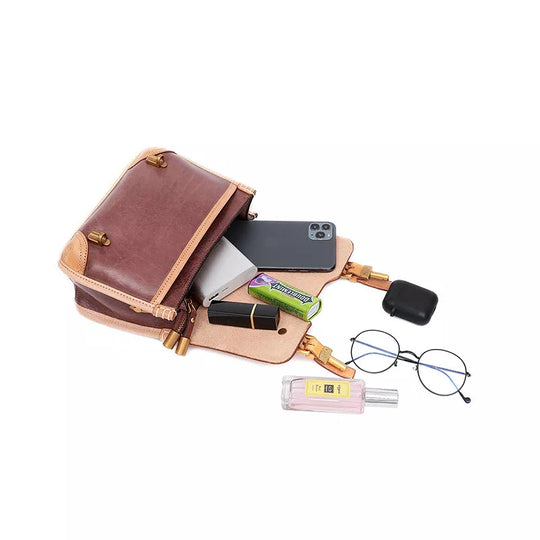 Compact satchel bag with exclusive detailing