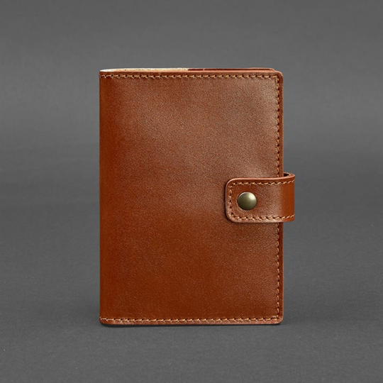 Travel-inspired leather passport sleeve