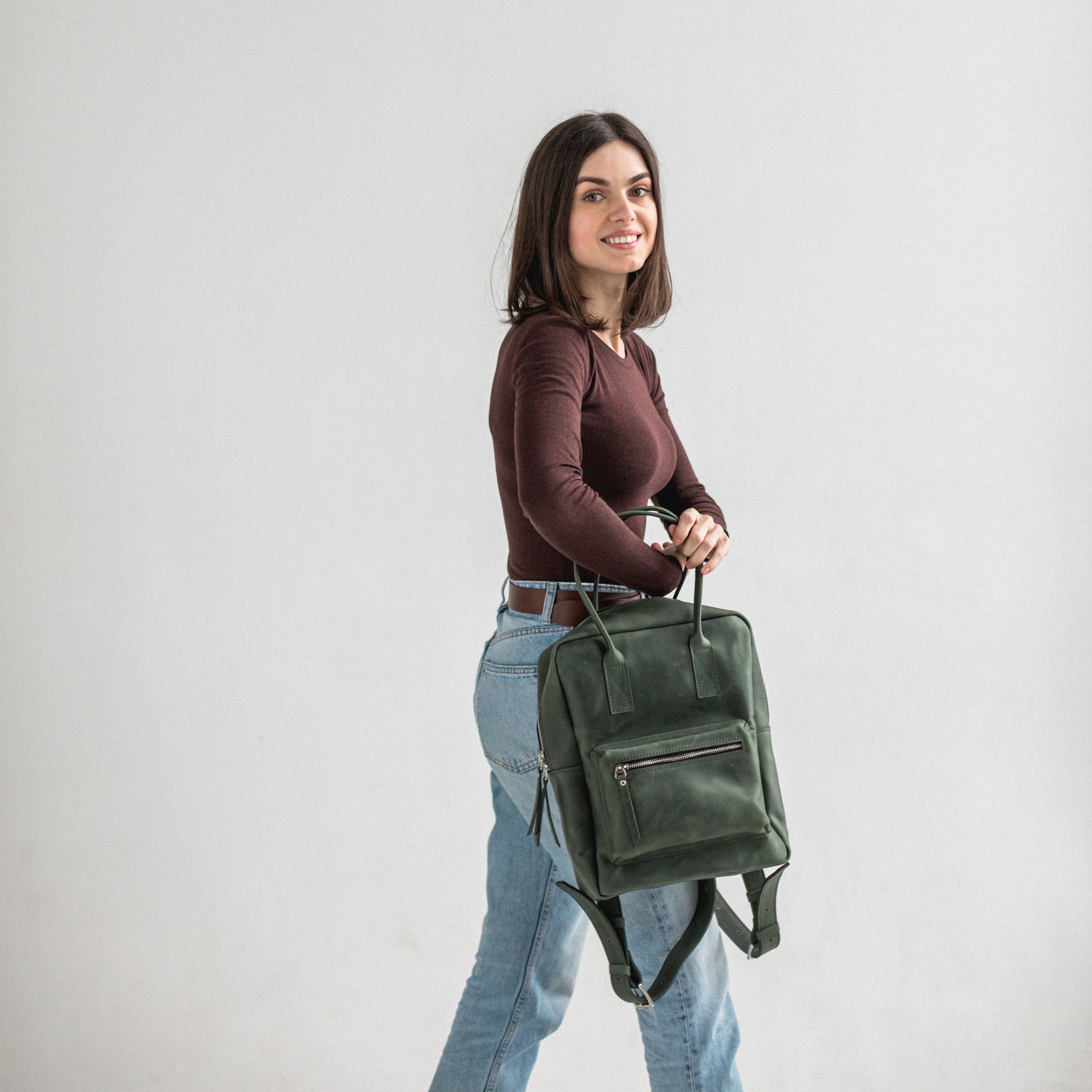 city backpack in vintage leather Green leather city backpack Silver
