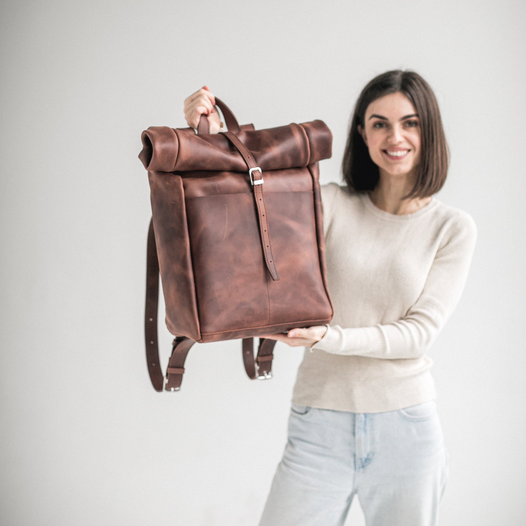 Whiskey brown leather roll-top backpack Silver