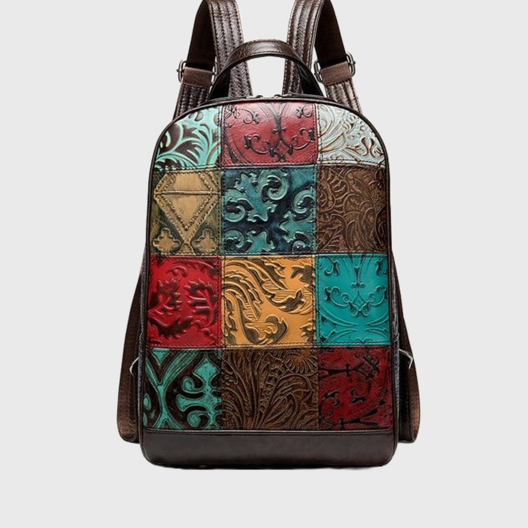 Multi-color leather backpack with embossed patterns on patchwork design