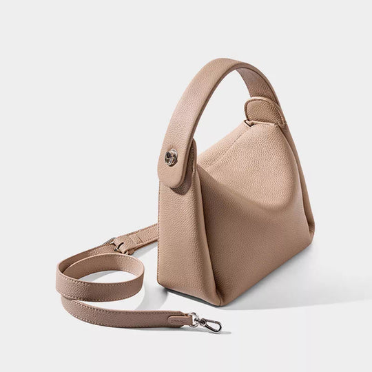 Sophisticated leather crossbody bag with timeless design and top handle