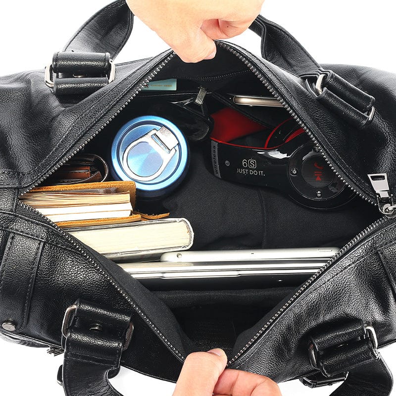 Fashionable black leather shoulder travel bag from a designer brand