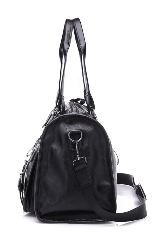 Chic and elegant designer black travel bag with shoulder carry