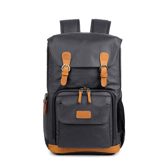 Water-resistant canvas camera backpack