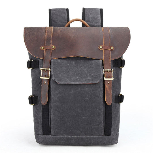 Waxed canvas camera and lens backpack