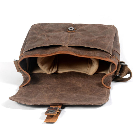 Messenger-style camera carry bag in waxed canvas